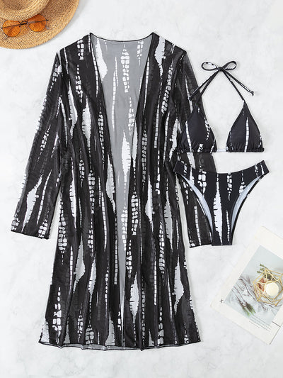 White and black tie-dye three-piece bikini set with a triangle top, high-cut bottoms, and a sheer long-sleeve cover-up. - Image 32