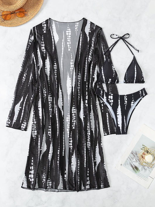 White and black tie-dye three-piece bikini set with a triangle top, high-cut bottoms, and a sheer long-sleeve cover-up. - Image 32