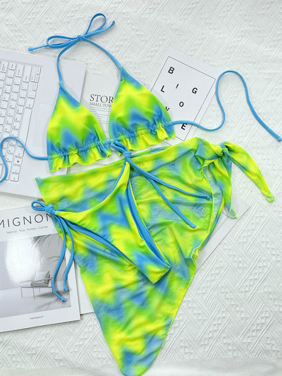 Vibrant green and blue tie-dye bikini set with a matching sarong cover-up, featuring halter top and tie-side briefs. - Image 15
