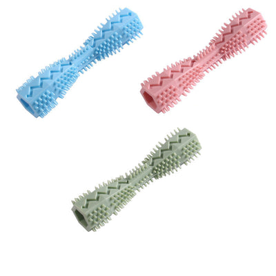 Pink textured dog chew toy with nubs and ridges for teeth cleaning, designed like a stick with a hollow center. - Image 12