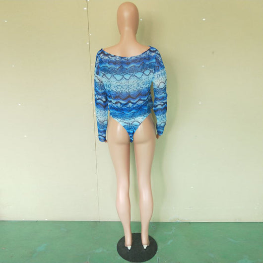 Woman in a purple and pink snakeskin print three-piece swimsuit with an off-shoulder crop top and high-waisted bottoms. - Image 30