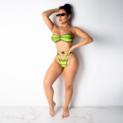 Woman in a purple and pink snakeskin print three-piece swimsuit with an off-shoulder crop top and high-waisted bottoms. - Image 31