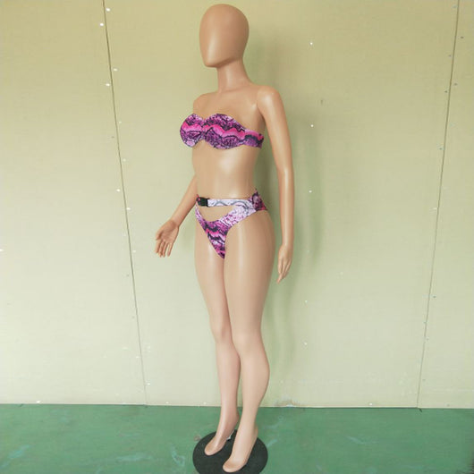 Woman in a purple and pink snakeskin print three-piece swimsuit with an off-shoulder crop top and high-waisted bottoms. - Image 33