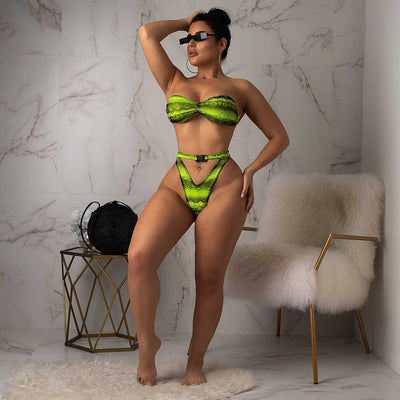 Woman in a purple and pink snakeskin print three-piece swimsuit with an off-shoulder crop top and high-waisted bottoms. - Image 47