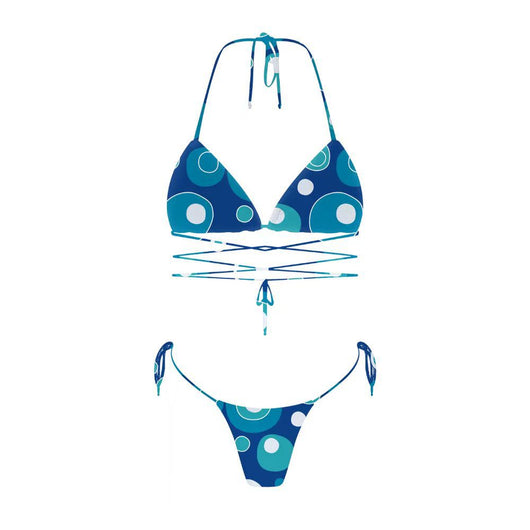 Woman in a light blue patterned triangle bikini with tie-side bottoms on a sandy beach with palm trees. - Image 37