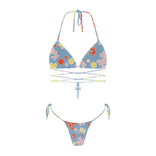 Woman in a light blue patterned triangle bikini with tie-side bottoms on a sandy beach with palm trees. - Image 38