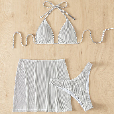 Light green ribbed bikini set featuring a triangle halter top and a matching high-waisted mini skirt. - Image 22