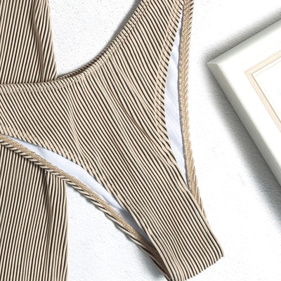 Light green ribbed bikini set featuring a triangle halter top and a matching high-waisted mini skirt. - Image 30