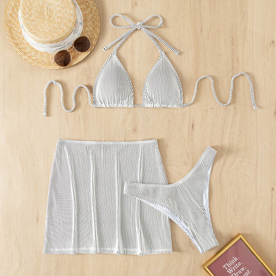 Light green ribbed bikini set featuring a triangle halter top and a matching high-waisted mini skirt. - Image 31