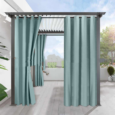Light gray blackout curtains with grommets hanging from a dark gray pergola on an outdoor patio. - Image 11