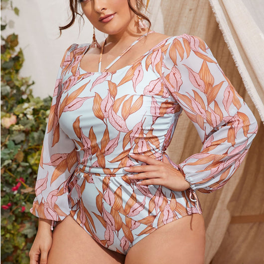 Women's light blue one-piece swimsuit with pink and orange leaf print, long sheer chiffon sleeves, and ruched details. - Image 15