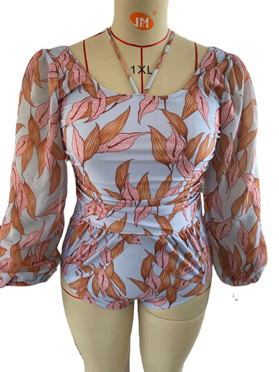 Women's light blue one-piece swimsuit with pink and orange leaf print, long sheer chiffon sleeves, and ruched details. - Image 16
