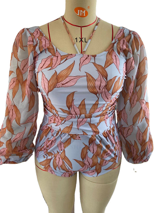 Women's light blue one-piece swimsuit with pink and orange leaf print, long sheer chiffon sleeves, and ruched details. - Image 16