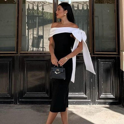 Vestido de Cóctel Elegante con Hombros Descubiertos y Moño en Blanco y Negro - Image 8