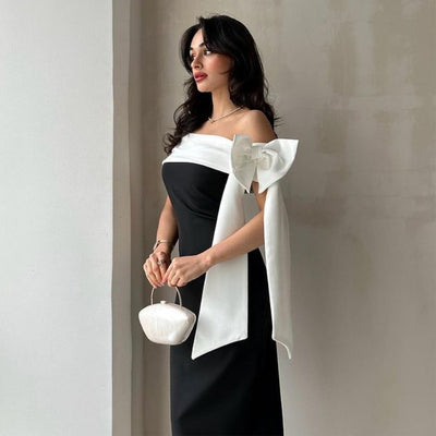 Vestido de Cóctel Elegante con Hombros Descubiertos y Moño en Blanco y Negro - Image 9