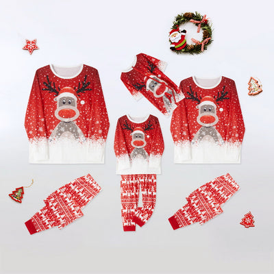 Family of four wearing matching red Christmas pajamas with reindeer and snowflake print, plus red pom-pom beanies. - Image 13
