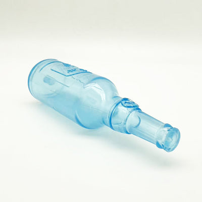 Translucent blue pet molar toy shaped like a bottle, featuring embossed paw prints and the word "DOG". - Image 17