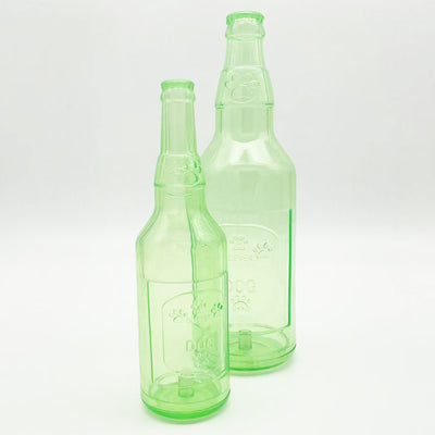 Translucent blue pet molar toy shaped like a bottle, featuring embossed paw prints and the word "DOG". - Image 20