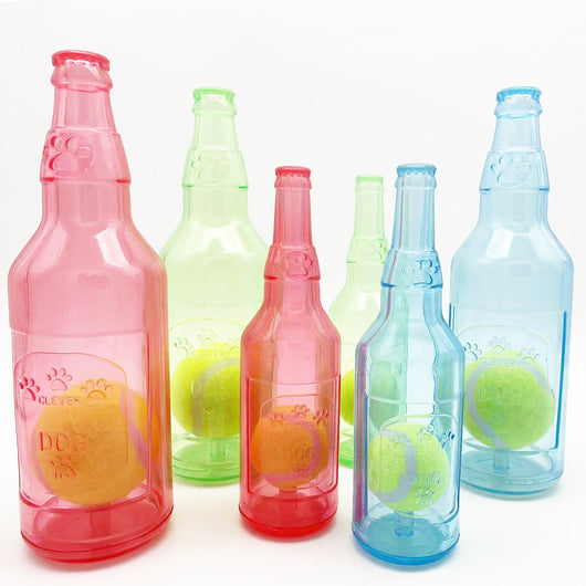 Translucent blue pet molar toy shaped like a bottle, featuring embossed paw prints and the word "DOG". - Image 22