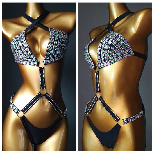 White rhinestone bikini with triangle tops, high-cut bottoms, and silver-toned O-rings and chains. - Image 9
