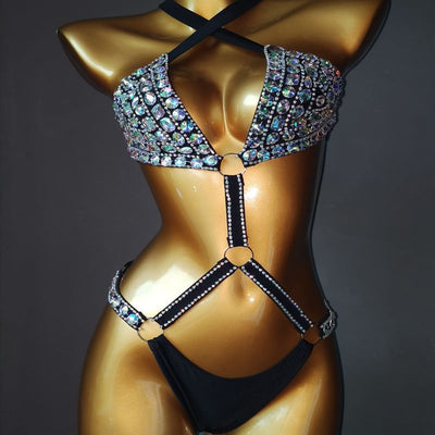 White rhinestone bikini with triangle tops, high-cut bottoms, and silver-toned O-rings and chains. - Image 10