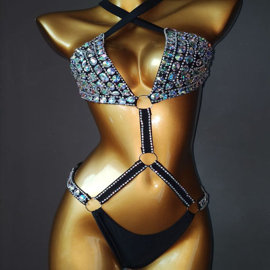 White rhinestone bikini with triangle tops, high-cut bottoms, and silver-toned O-rings and chains. - Image 10