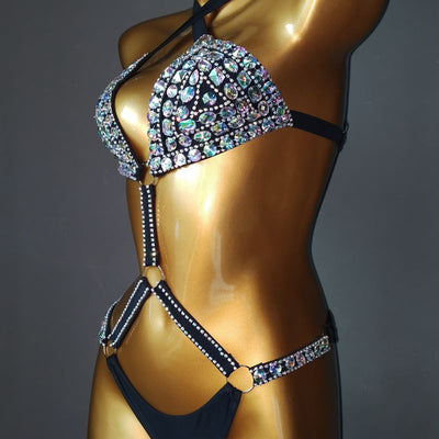 White rhinestone bikini with triangle tops, high-cut bottoms, and silver-toned O-rings and chains. - Image 11