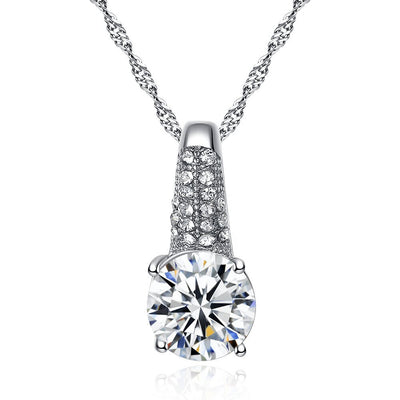 Gold-toned bridal necklace and hoop earrings set with large round cubic zirconia stones and pave accents. - Image 10