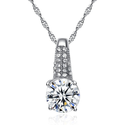 Gold-toned bridal necklace and hoop earrings set with large round cubic zirconia stones and pave accents. - Image 10