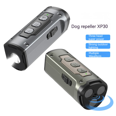 Black handheld ultrasonic dog deterrent device with three sonic emitters and an LED flashlight on a white background. - Image 14