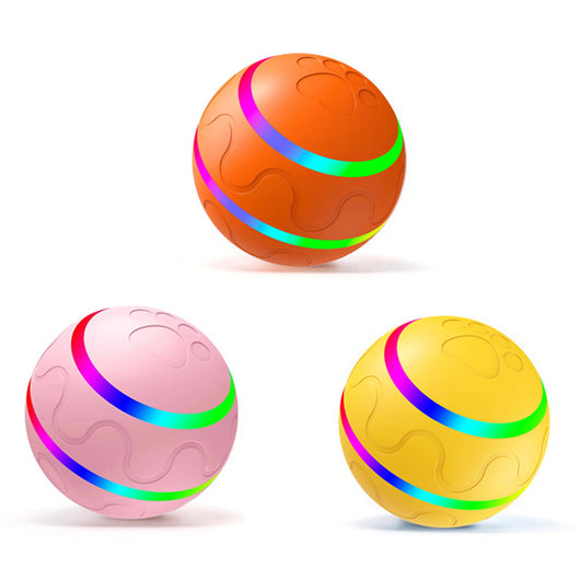 Orange pet wicked ball toy with colorful LED lights and a yellow paw-shaped remote control. - Image 27