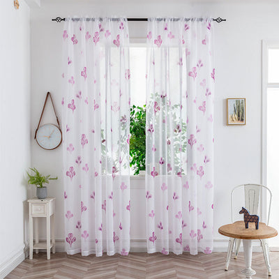 Sheer white mesh curtains with purple and light blue floral patterns, hung on a black rod in a bright room. - Image 23