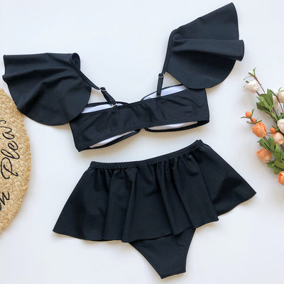 Women's red three-piece bikini flounced swimsuit with an off-shoulder bandeau top and a matching skirt. - Image 13