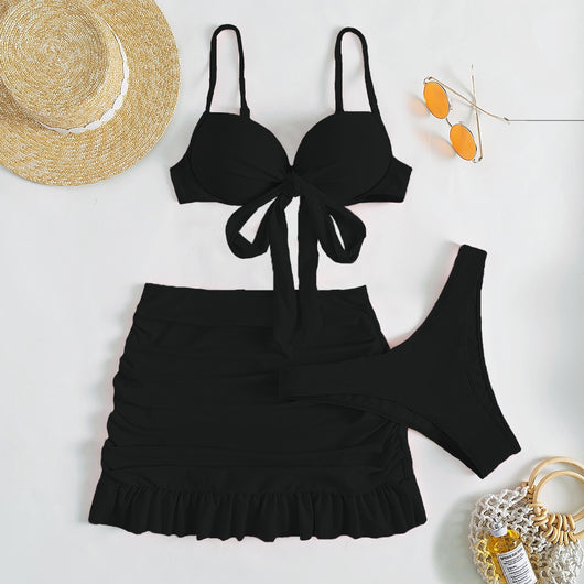 Light blue three-piece women's swimsuit with a bow-front bikini top, ruched mini skirt, and matching bottoms. - Image 13