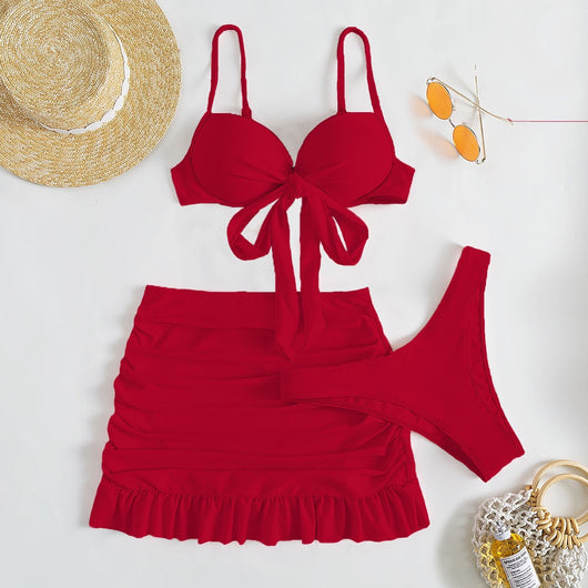 Light blue three-piece women's swimsuit with a bow-front bikini top, ruched mini skirt, and matching bottoms. - Image 15
