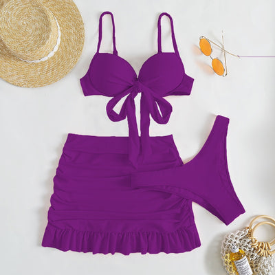 Light blue three-piece women's swimsuit with a bow-front bikini top, ruched mini skirt, and matching bottoms. - Image 18