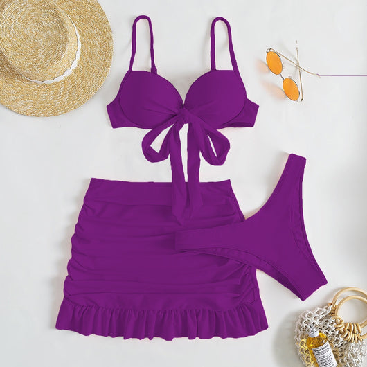 Light blue three-piece women's swimsuit with a bow-front bikini top, ruched mini skirt, and matching bottoms. - Image 18