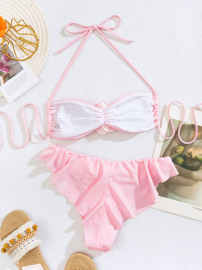 Women's pink halter bikini with a 3D flower on the top and ruffled edges on the bikini bottom. - Image 19