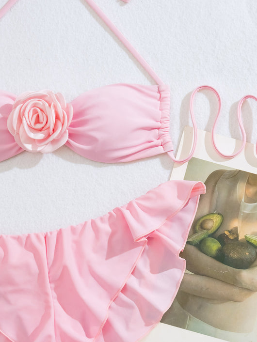 Women's pink halter bikini with a 3D flower on the top and ruffled edges on the bikini bottom. - Image 21