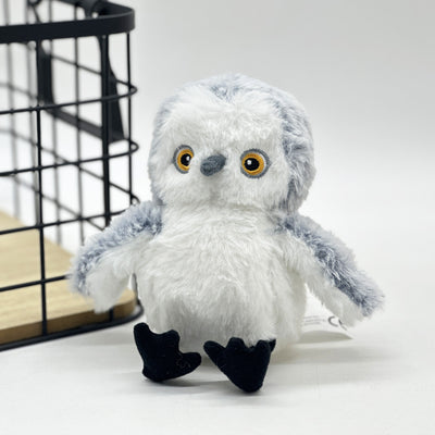 Interactive plush bird cat toy with brown and white fur, flapping wings, and a small tabby kitten observing. - Image 15