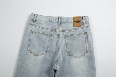 Jeans Holgados Retro con Rotos y Parches para Hombre - Image 25