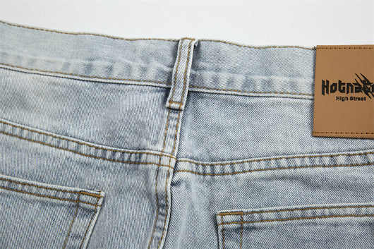 Jeans Holgados Retro con Rotos y Parches para Hombre - Image 30