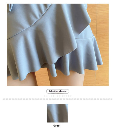 Women's light blue one-piece swimsuit with tie-front bust and ruffled hem, paired with a sheer shimmery cover-up. - Image 24