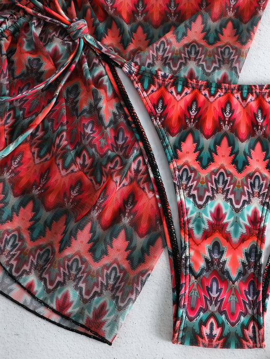Three-piece printed swimsuit with a red and teal abstract pattern, featuring a halter bikini top, bottom, and mesh wrap skirt with drawstring. - Image 52
