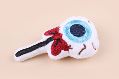 Plush cat teaser shaped like an eyeball lollipop with a blue iris, black pupil, and red bow. - Image 12