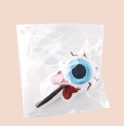 Plush cat teaser shaped like an eyeball lollipop with a blue iris, black pupil, and red bow. - Image 17