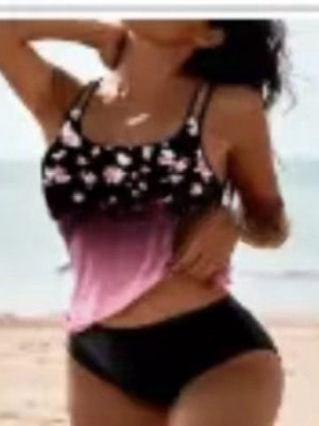 Woman wearing a red retro split high waist tankini swimsuit with an ornate mandala print top on a beach. - Image 20