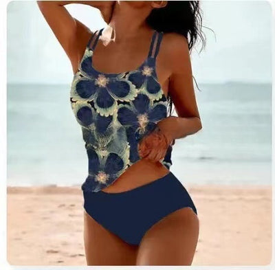 Woman wearing a red retro split high waist tankini swimsuit with an ornate mandala print top on a beach. - Image 23