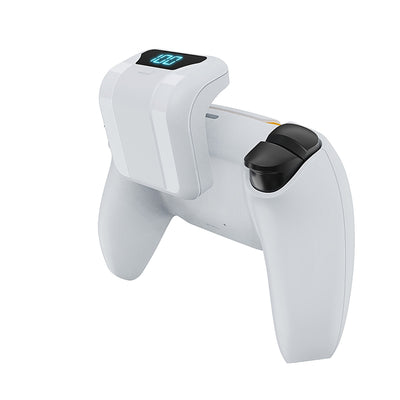White portable battery pack with digital display attached to a PS5 controller, showing 100% charge. - Image 21
