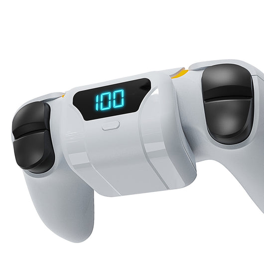 White portable battery pack with digital display attached to a PS5 controller, showing 100% charge. - Image 22